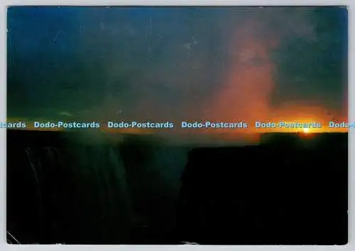 D302318 Simbabwe Sunrise Over the Victoria Falls Tourist Promotion in Africa Ltd