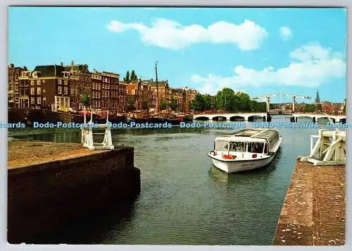 D317033 Amsterdam. Holland. Die Amstel mit schmalem Steg. ST.Gebr. Spanjersber