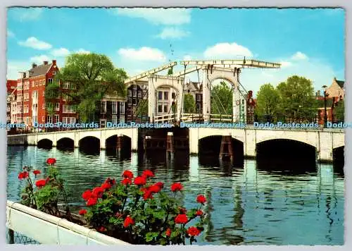 D315082 Holland. Niederlande. Amsterdam. Magere Brücke. MUVA. Valkenburg. 1970.