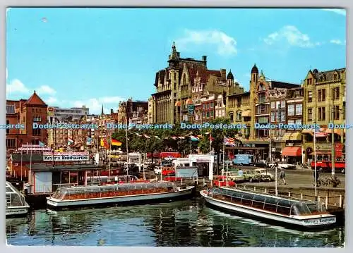 D315279 Niederlande. Amsterdam. Damrak met rondvaartboten. Krüger. Wandert. 1983