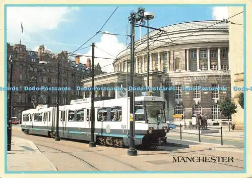 D233937 Manchester Metro Link Straßenbahn vorbei an der Zentralbibliothek am St. Peter Squar