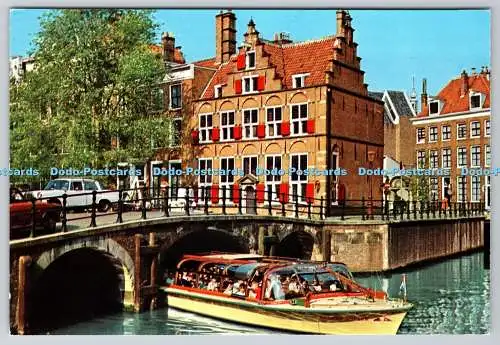 D325089 Niederlande. Amsterdam. Het huis aan de drie grachten. Krüger. Schlitten fahren.