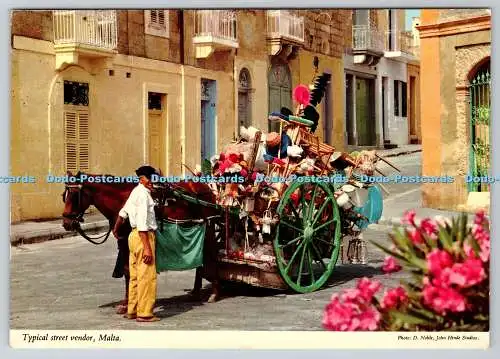 D325230 Malta. Typischer Straßenverkäufer. Bunter von Pferden gezeichneter Haushaltsladen. D.