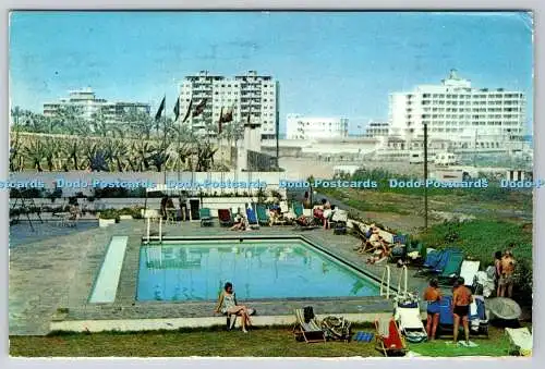 D331853 Teneriffa. Puerto de la Cruz. Piscina Hotel Oro Negro y Hoteles al Fondo.
