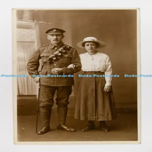 C029858 Woking Man in Uniform with Woman Emberson