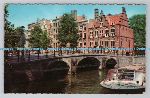 R804781 Amsterdam. O. Z. Voorburgwal met Huis. a. d. Drie Grachten. Krüger