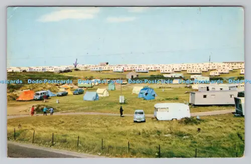 R808664 Wohnwagen auf Sanddünen bei den Towans. Hayle. R. Short. Die Towans. Denni