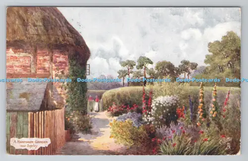 R806050 Ein Hampshire-Garten in der Nähe von Sopley. stecken. Oilette. 9320. PM. West Kensington