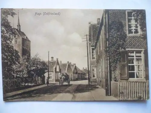 2 AK Hage Ostfriedland Straßenansicht + Kirche