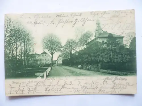 AK Niederzwönitz Straßenansicht mit Kirche