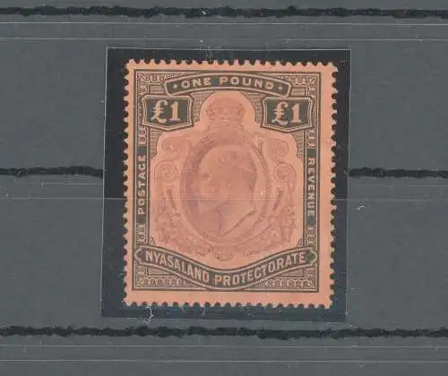 1908 Nyasaland Protectorate - Stanley Gibbons Nr. 81 - £ 1 lila und schwarz - papierrot - MH*