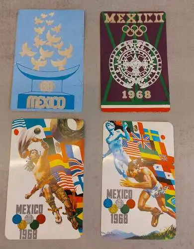 [Lithographie] 4 Postkarten Olympische Spiele 1968 Mexiko / Olympia
Karte 1: Olympisches Feuer. Die Tauben und der Schriftzug “Mexico” sind geflockt. (neu ohne Beschriftung)
Karte 2: Aztekenkalender. Der Schriftzug “Mexico” und das Jahr 1968...