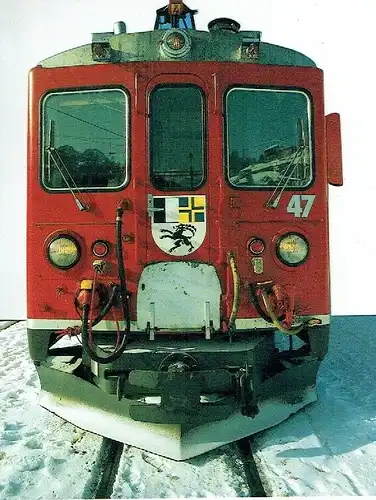 Lokomotive der Rhätischen Bahn
 Postkarte
 unten rechteckig, sind die Bahnteile oben und rechts ausgestanzt, stehen ab und sind deshalb empfindlich, aber nicht beschädigt. 