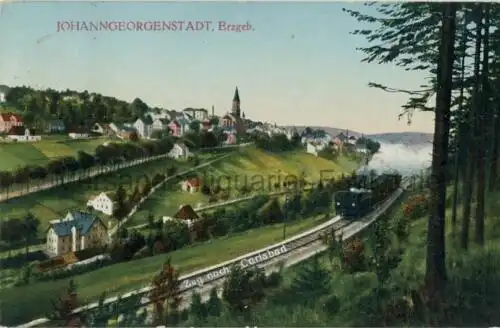 Johanngeorgenstadt - Zug nach Carlsbad
 Ansichtskarte / Postkarte, Motiv aus Erzgebirge / Sachsen, benutzt 9.7.1931, im Text schreibt der Absender, das das Tal, welches auf der Karte zu sehen ist, gerade unter Hochwasser steht. 