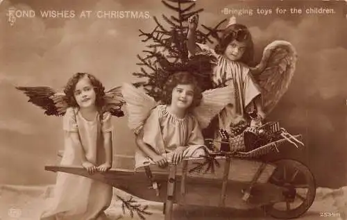 A053 Weihnachten Fotomontage Mädchen Engelsflügel Baum bringt Spielzeug Kind Postkarte