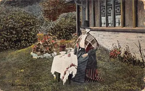 A982 Wales 1909 Frau in traditioneller Volkskostüm beim Afternoon Tea Postkarte