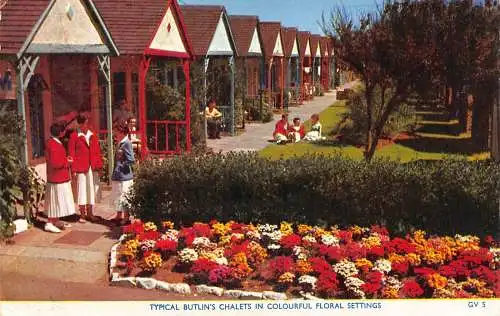 England 1959 Typische Butlins Chalets bunte Blumenfassungen Pension Postkarte