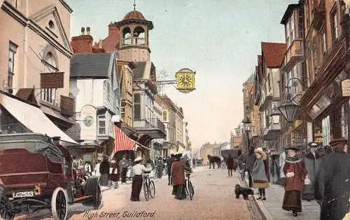 England 1910 Guildford High Street Uhr Autos Hund Fahrrad Vintage Postkarte
