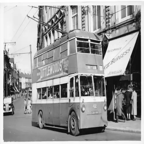 A722 Doppeldecker Bus Uhrmacher Burgess Juwelier Littlewoods RPPC Postkarte