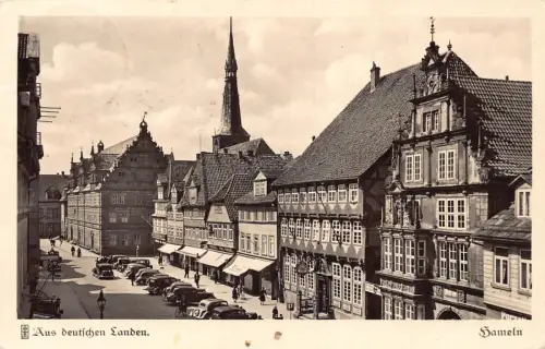 Deutschland 1938 Hameln Osterstraße Hochzeitshaus Autos RPPC Postkarte