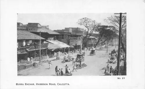 L379 Indien Burra Basar Harrison Road Kalkutta Reisebusse Karren Geschäfte Postkarte