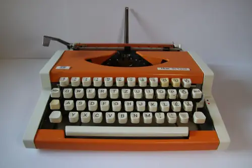 Vintage UNIS TBM Deluxe orange Space Age Schreibmaschine