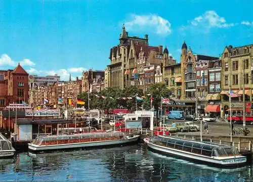 Netherlands Amsterdam Damrak tour boats