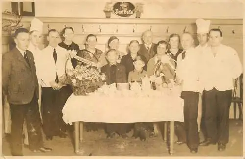 Restaurant souvenir anonymous persons group photo