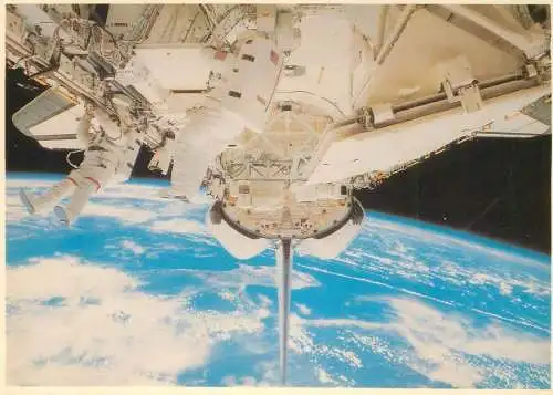 NASA astronauts performing extra vehicular activity in space