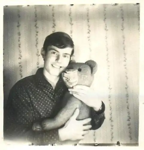 Photograph ca. 6 x 6 cm anonymous person posing with teddy bear