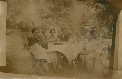 Photographic souvenir postcard family outdoor
