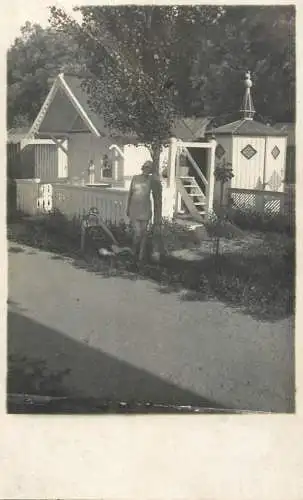 Photographic souvenir postcard to identify