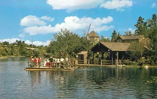 Walt Disneyworld Heading for Adventure tourists sailing log raft to Tom Sawyer Island