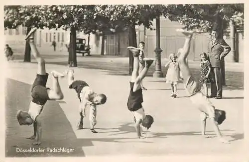 Germany Dusseldorf Radschlager cartwheelers children types and scenes