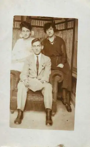 Photographic postcard social history souvenir young man and ladies portrait