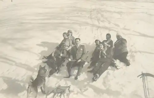 Photographic postcard family souvenir vintage photo winter sports persons sledge dog pet c.1932