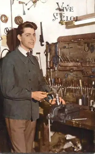 Young man who works at the vise vive St. Eloi greetings postcard France 1961