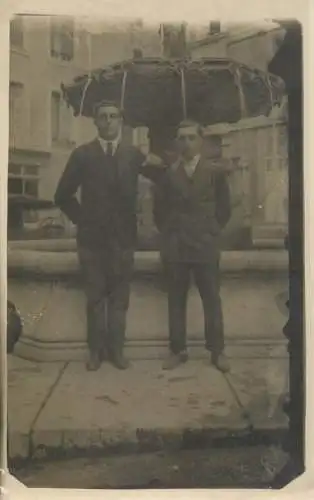 Young men souvenir old photo postcard