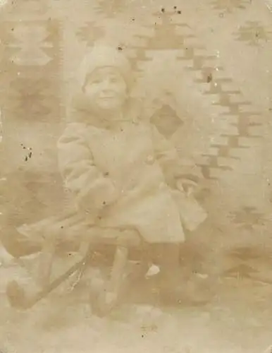 Anonymous persons boy sledge