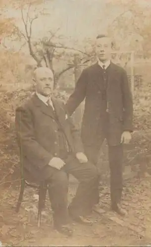 Social history annonymous persons souvenir photo elegant man and boy