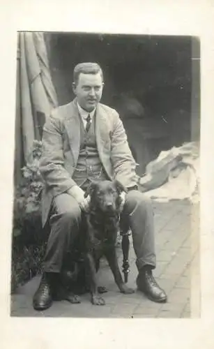 Social history annonymous persons souvenir photo elegant man and dog
