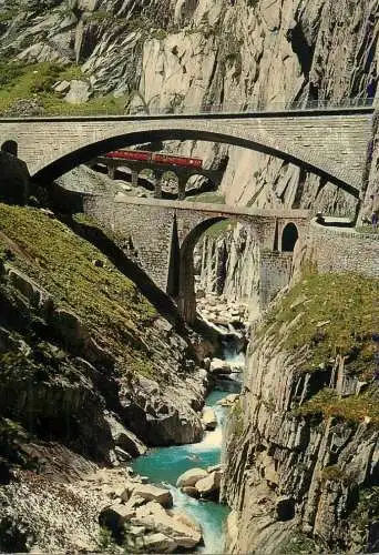 Switzerland Schollenen Schlucht Teufelsbrucke mit der Schollenen-Bahn