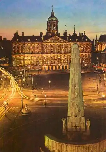 Netherlands Amsterdam Koninglijk Paleis met National Monument night view
