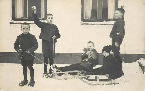 Real photo children playing in the snow