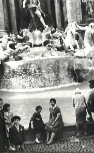 Real photo elegant woman at fountain