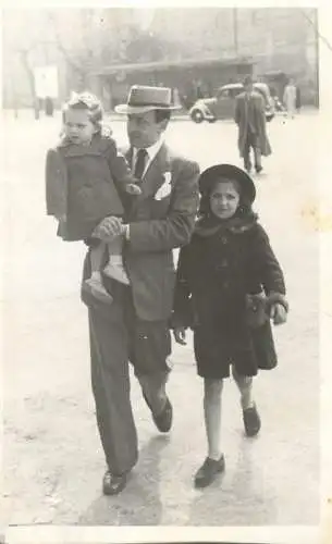 Real photo elegant man and his girls