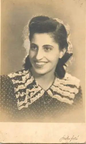 Social history anonymous persons portrait souvenir photo elegant woman 1945