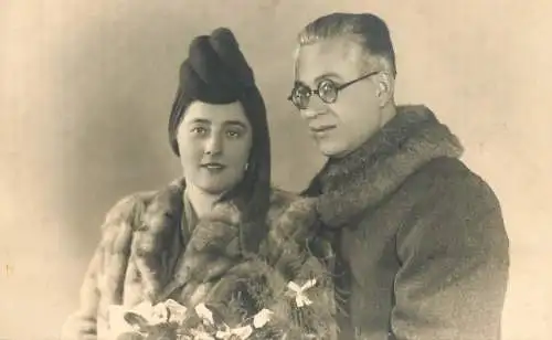 Social history anonymous persons portrait souvenir photo elegant couple fur coat 1946