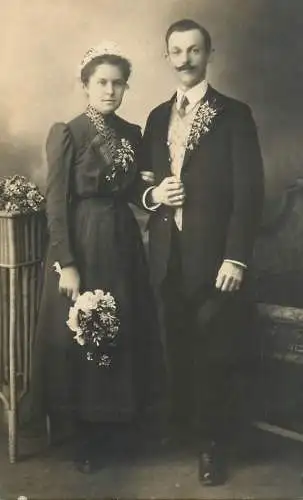 Social history anonymous persons portrait souvenir photo elegant couple moustache