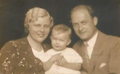 Social history anonymous persons portrait souvenir elegant couple and baby